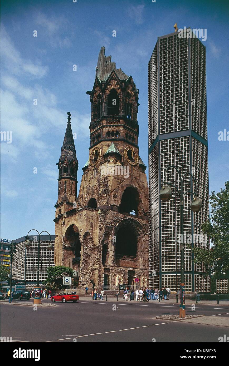 Germany, Berlin. The Kaiser Wilhelm Gedaechtnis Kirche (Kaiser Wilhelm Memorial Church), consisting of the ruins of the original church (1891-1895) and the new building designed by Egon Eiermann (1959-1961). Stock Photo