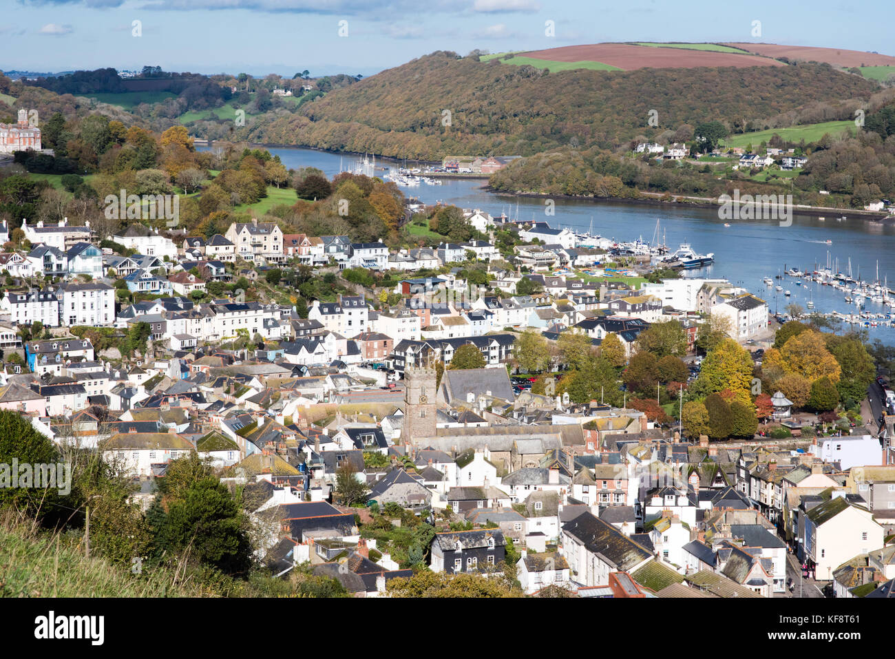 View of Dartmouth looking up the River Dart on a sunny autumnal day with the South Devon town nestled by the river Stock Photo