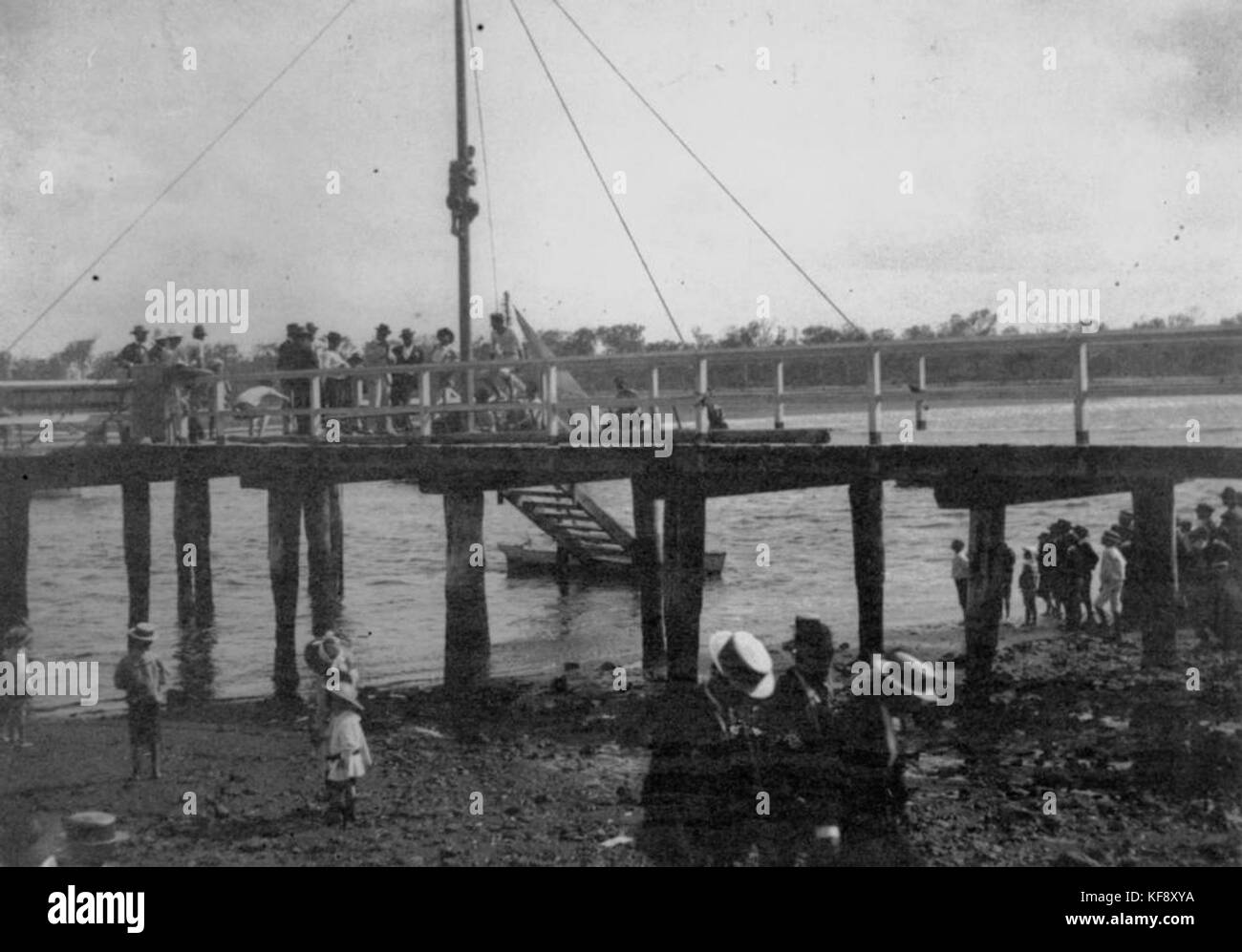 1 125219 Climbing the greasy pole on Corporation Jetty, Cabbage Tree Creek, ca. 1900 Stock Photo