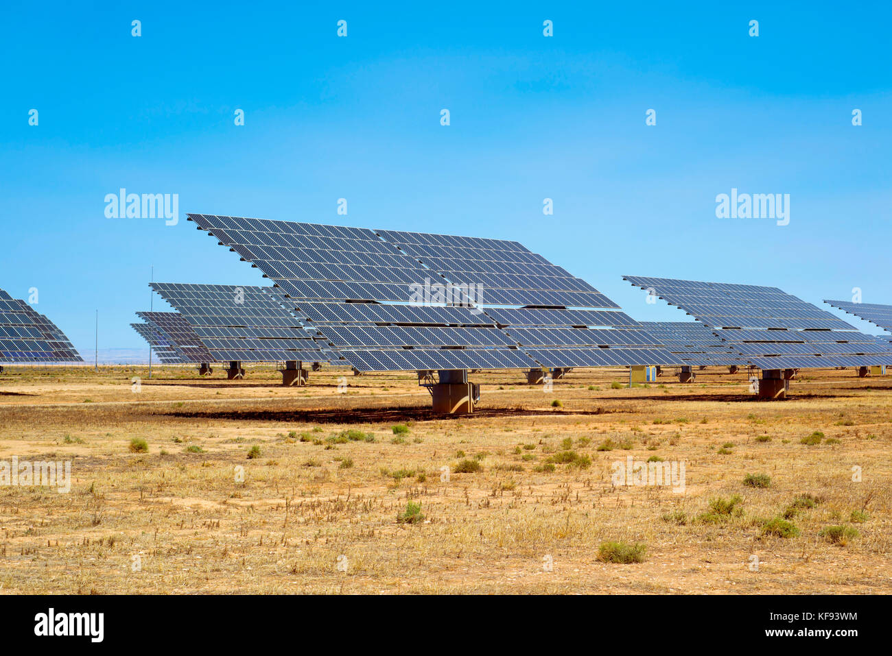 a view of some solar panels in a solar power plant in a desert