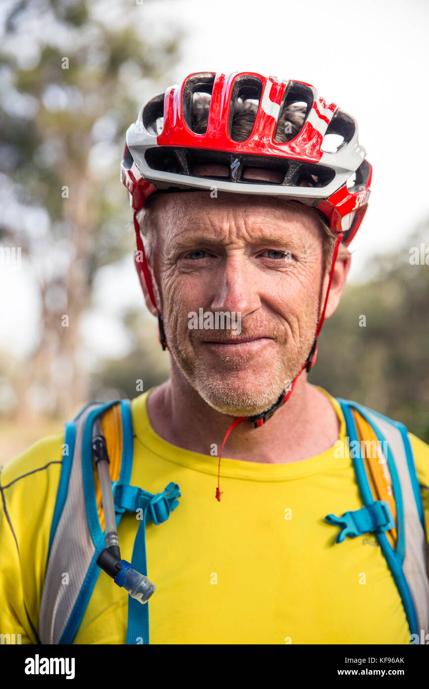 USA, Hawaii, The Big Island, mountain biking down mud lane from road 19