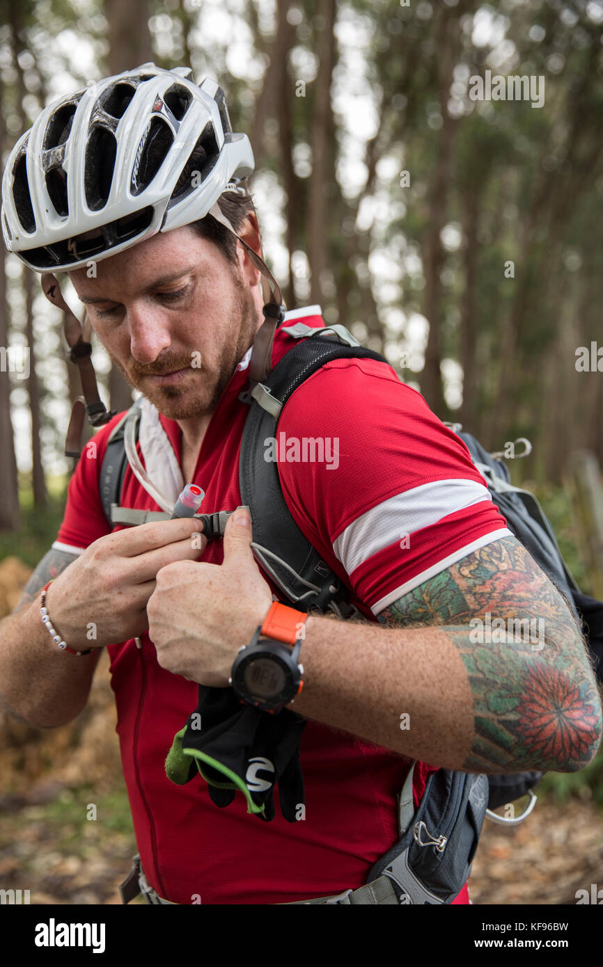 USA, Hawaii, The Big Island, mountain biking down mud lane from road 19