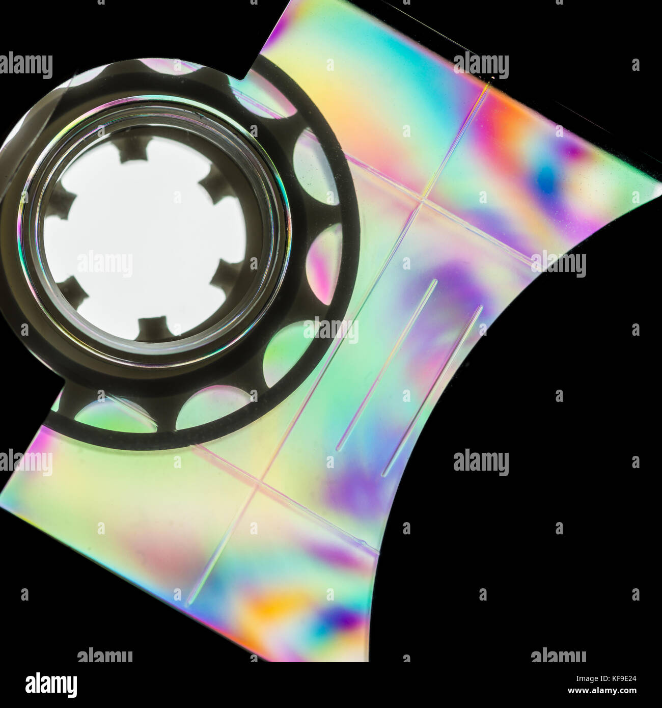 A colourful macro shot of a plastic cassette tape shot through linear polarising film. Stock Photo
