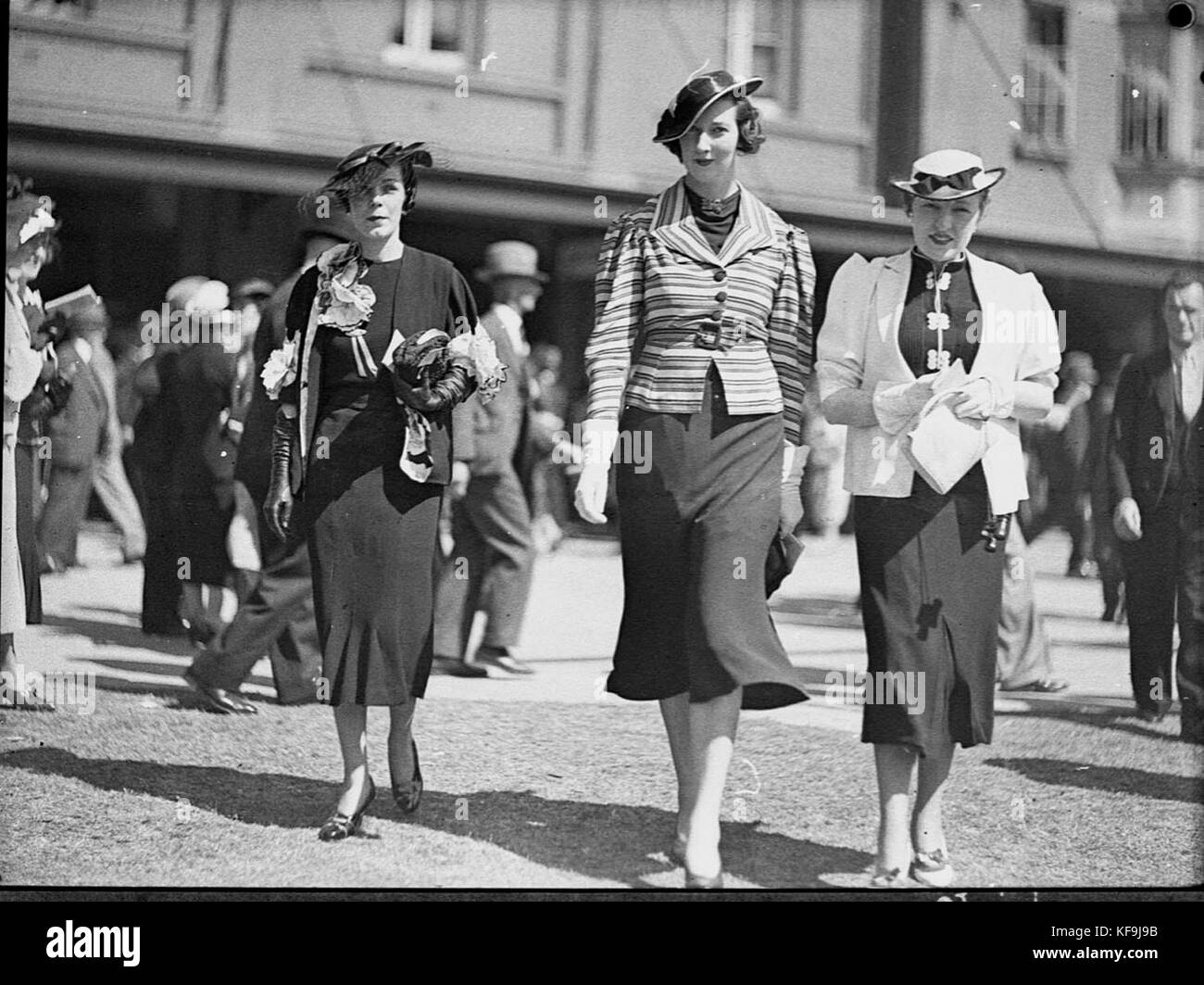 Randwick Races Attire This image captures a scene from the Randwick races, showcasing ...