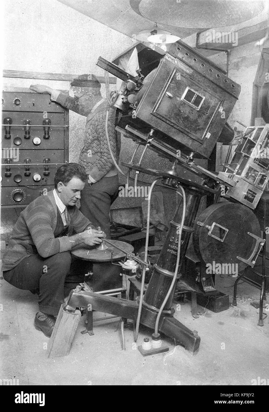 8675 Sound technicians setting up the turntable and amplifiers for the first talkies in Australia Warner Brothers Jazz Singer starring Al Jolson at the Lyceum The sound was recorded on a synchronized disc Stock Photo