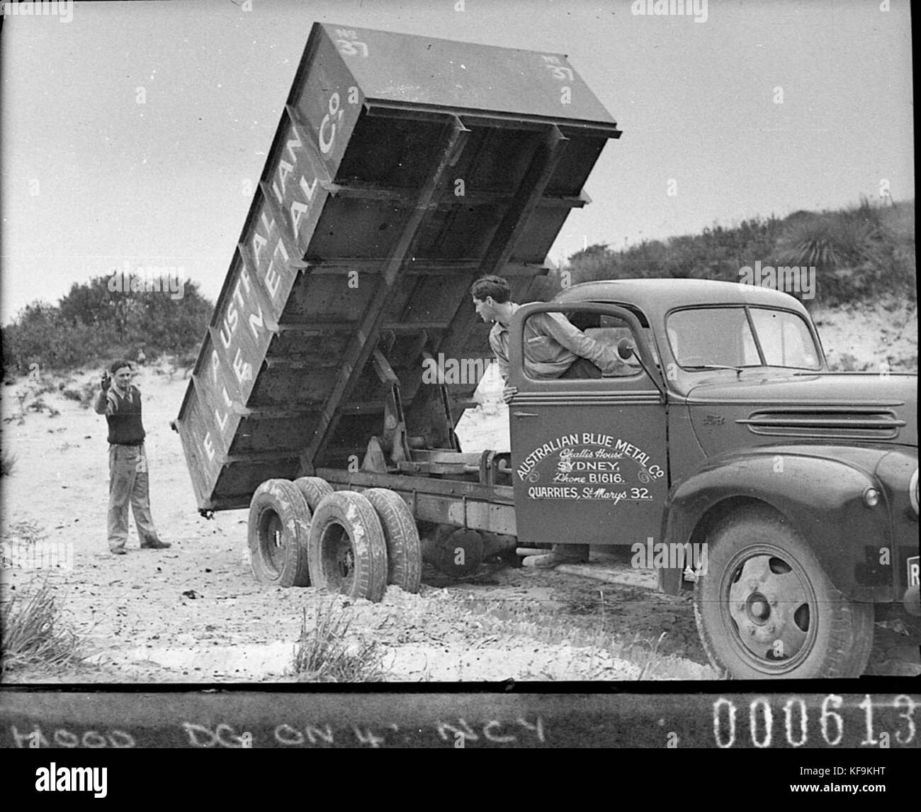 13080 Truck tipping its load Australian Blue Metal Co trucks for Mr