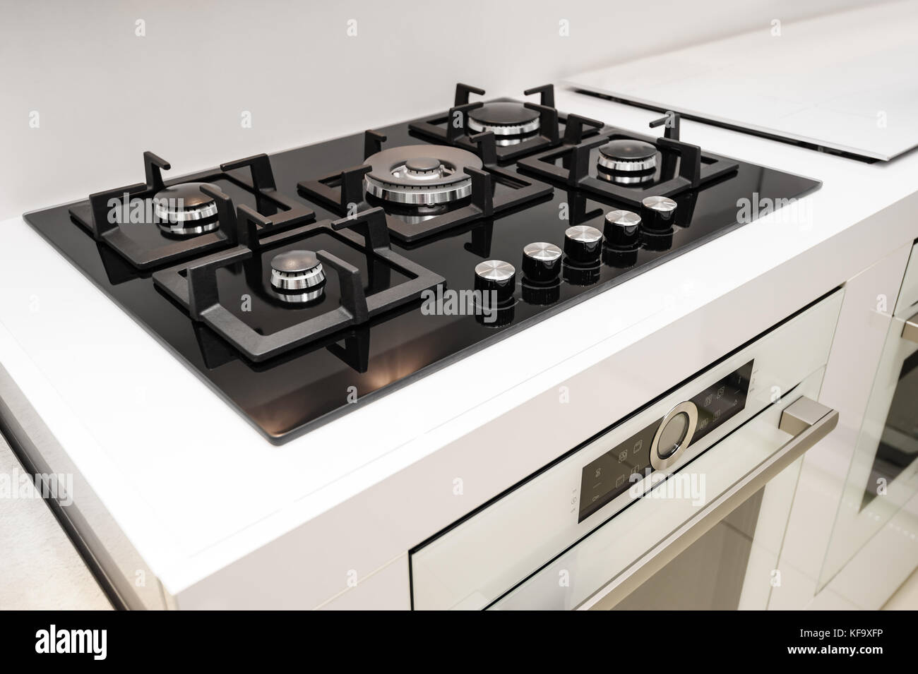 Brand new gas stove and embedded oven Stock Photo - Alamy