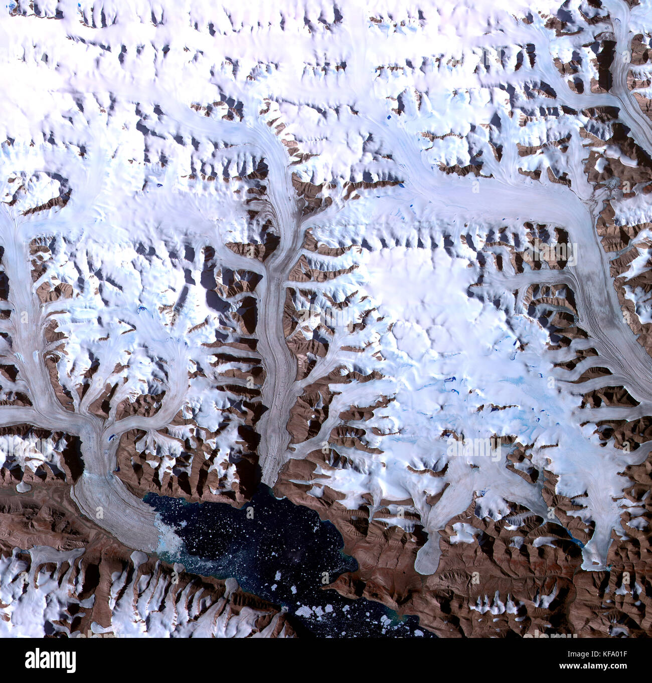 Dobbin Bay is at the bottom of this image of several glaciers in the Canadian Arctic on Ellesmere Island. The image was taken on July 31, 2000. Stock Photo