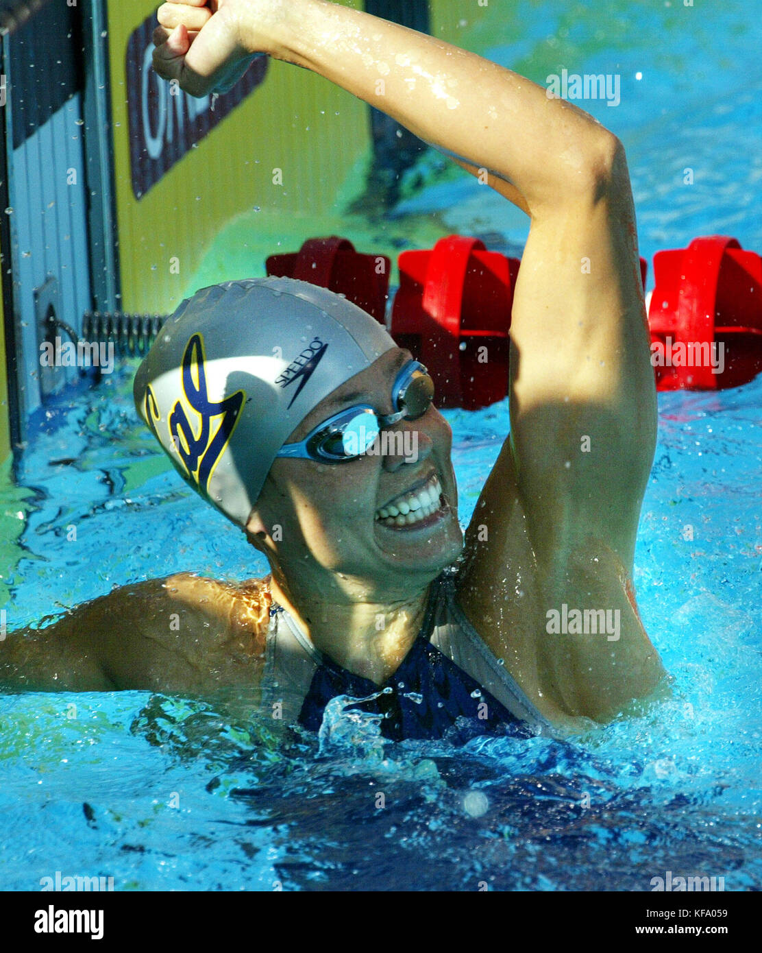 US swimmer Natalie Coughlin celebrates her victory in  the women's 100 meter backstroke at the U.S. Olympic Swimming Trials in Long Beach, California on 09 July 2004. Coughlin won in a time of 59.85. Photo by Francis Specker Stock Photo