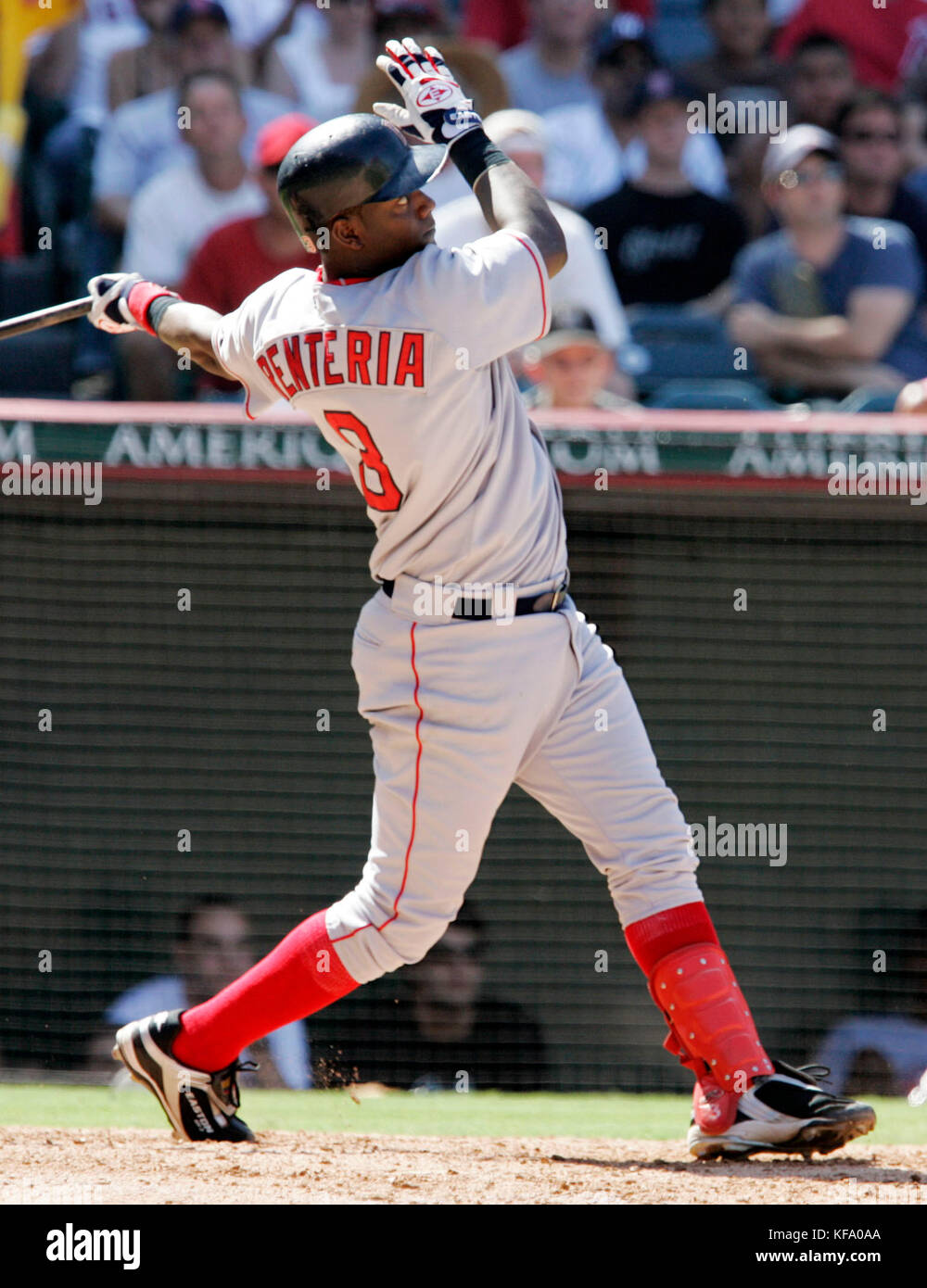 Red Sox's Edgar Renteria watches his three-run home run off Los