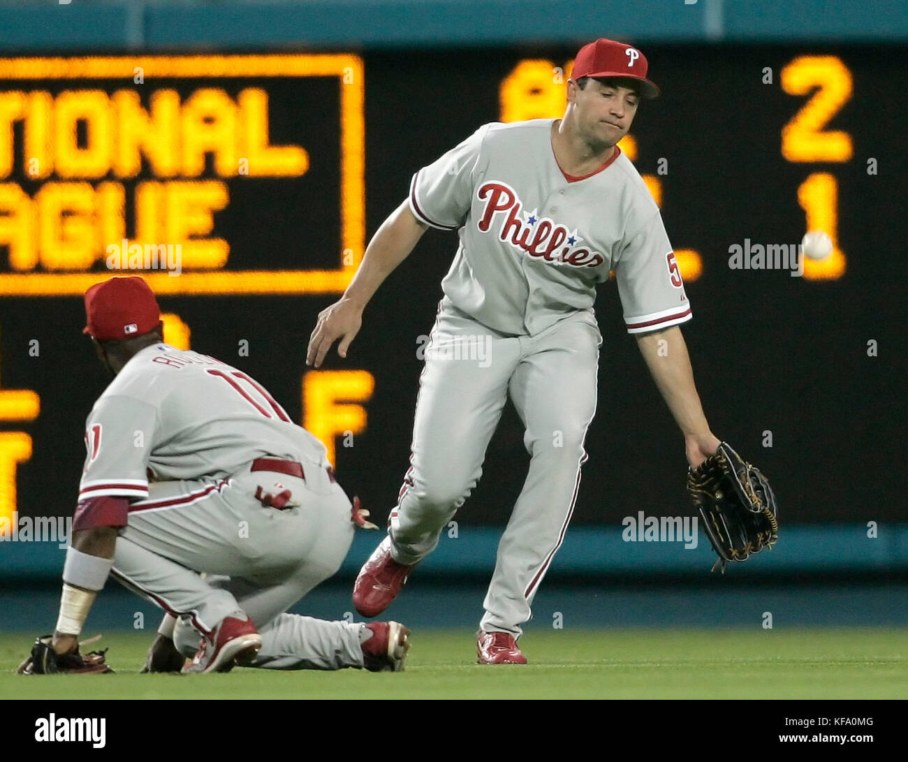 Philadelphia Phillies left fielder Pat Burrell, right, and shortstop