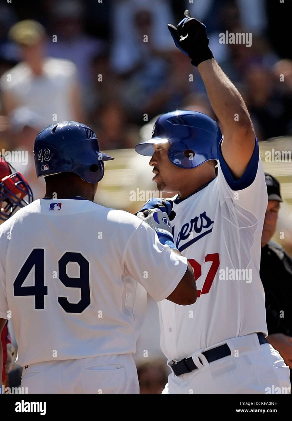 Los Angeles Dodgers Matt Kemp, right, celebrates with teammate Willy Aybar at home plate after hitting a two-run homer off Philadelphia Phillies pitcher Clay Condrey in the seventh inning of a baseball game in Los Angeles on Saturday, June 3, 2006. Photo by Francis Specker Stock Photo