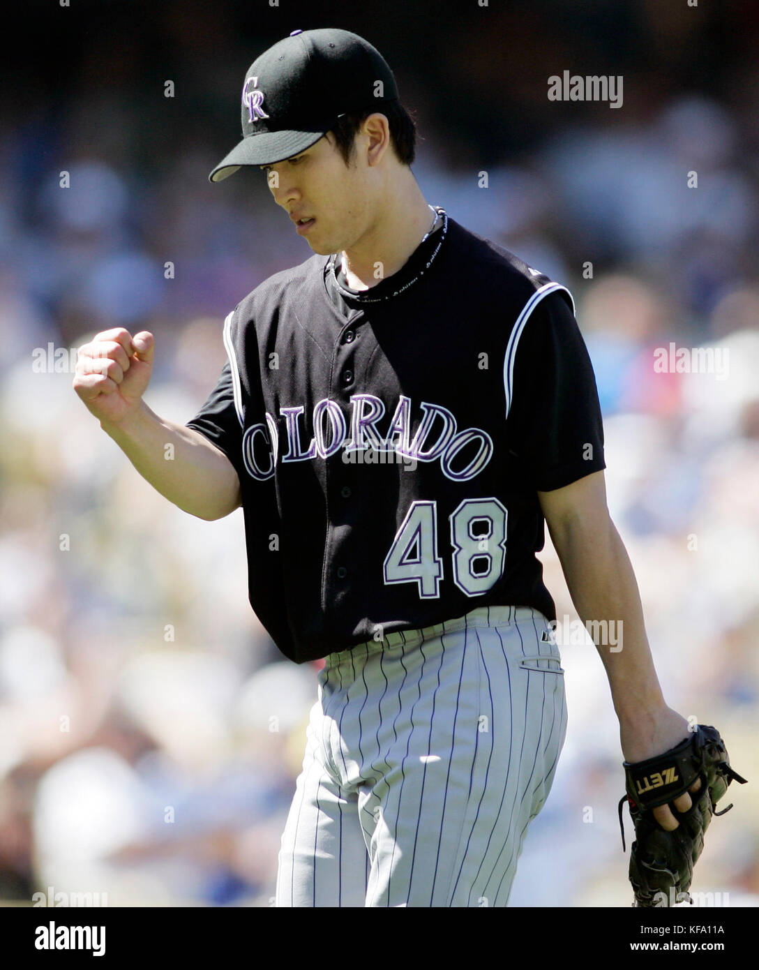 Colorado Rockies pitcher Byung-Hyun Kim, of South Korea, pumps his fist after getting Los Angeles Dodgers' Andre Ethier to ground into an inning-ending double play in the fifth inning of a baseball game in Los Angeles on Sunday, Sept. 3, 2006. Photo by Francis Specker Stock Photo