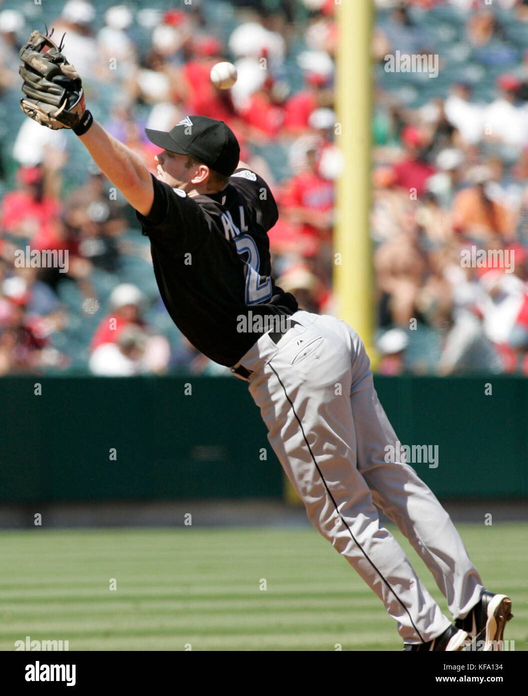 Toronto Blue Jays second baseman Aaron Hill tries to field an errant