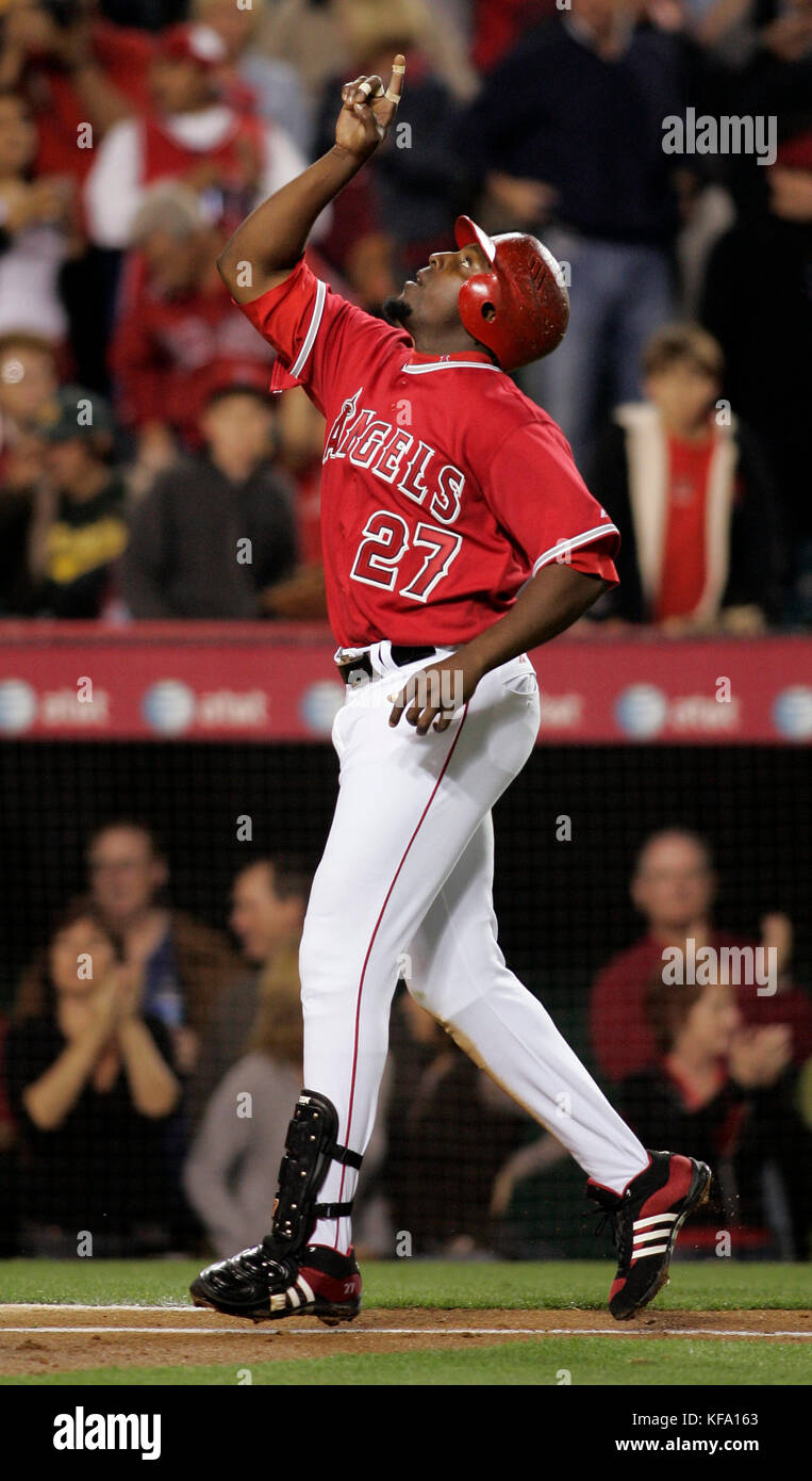 Los Angeles Angels' Vladimir Guerrero points skyward while crossing home plate after hitting a home run off Texas Rangers pitcher Vincente Padilla in the third inning of a baseball game in Anaheim, Calif., on Tuesday, April 3, 2007. Photo by Francis Specker Stock Photo