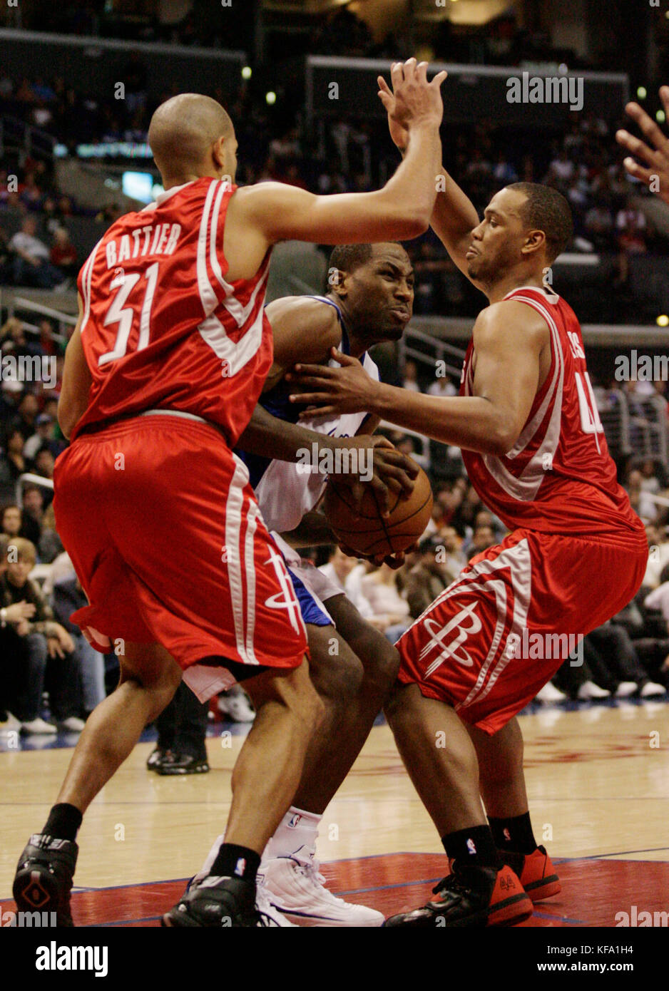 Los Angeles Clippers' Elton Brand, center, is double-teamed by Houston ...