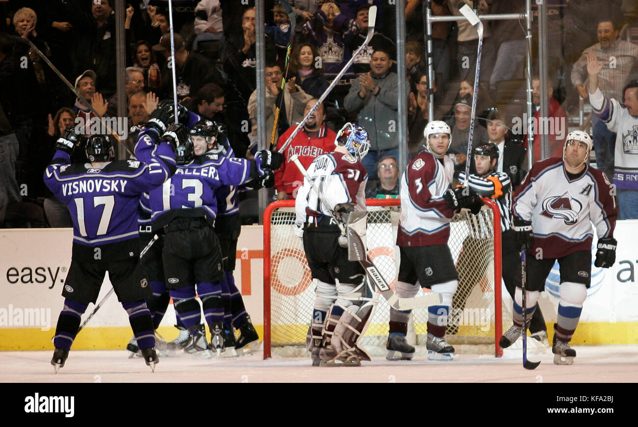 Los Angeles Kings players, Lubomir Visnovsky (17), of Slovakia, and Michael Cammalleri (13), celebrate a game-tying goal by Rob Blake with four seconds left in regulation time as Colorado Avalanche goalie Peter Budaj, (31), of Slovakia, looks down into the net with teammates Karlis Skrastins (3), of Latvia, and Andrew Brunette, right,  during an NHL hockey game in Los Angeles on Saturday, Feb. 24, 2007. The Kings won 6-5 in a shootout. Photo by Francis Specker Stock Photo