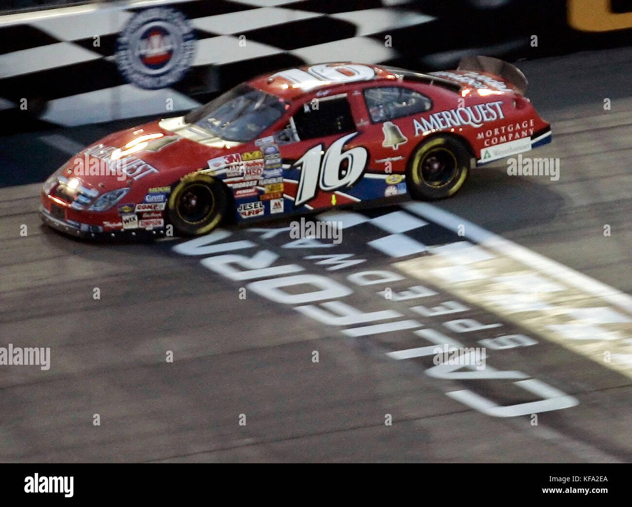 Greg Biffle drives past the finish line winning the Stater Bros. 300, a