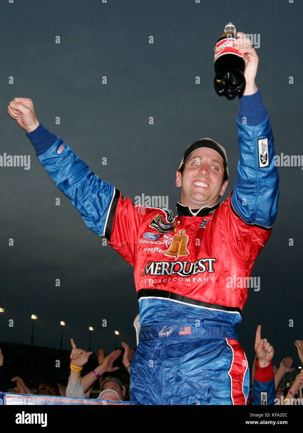 Driver Greg Biffle celebrates his victory at the Stater Bros. 300, a