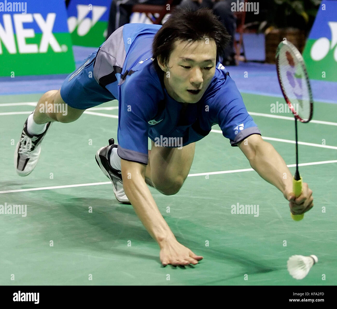 Hyun Ii Lee of Korea dives for the shuttlecock during a quarterfinal match  against Dan Lin of China at the IBF Badminton World Championships in  Anaheim, Calif. on Friday, Aug. 19, 2005.