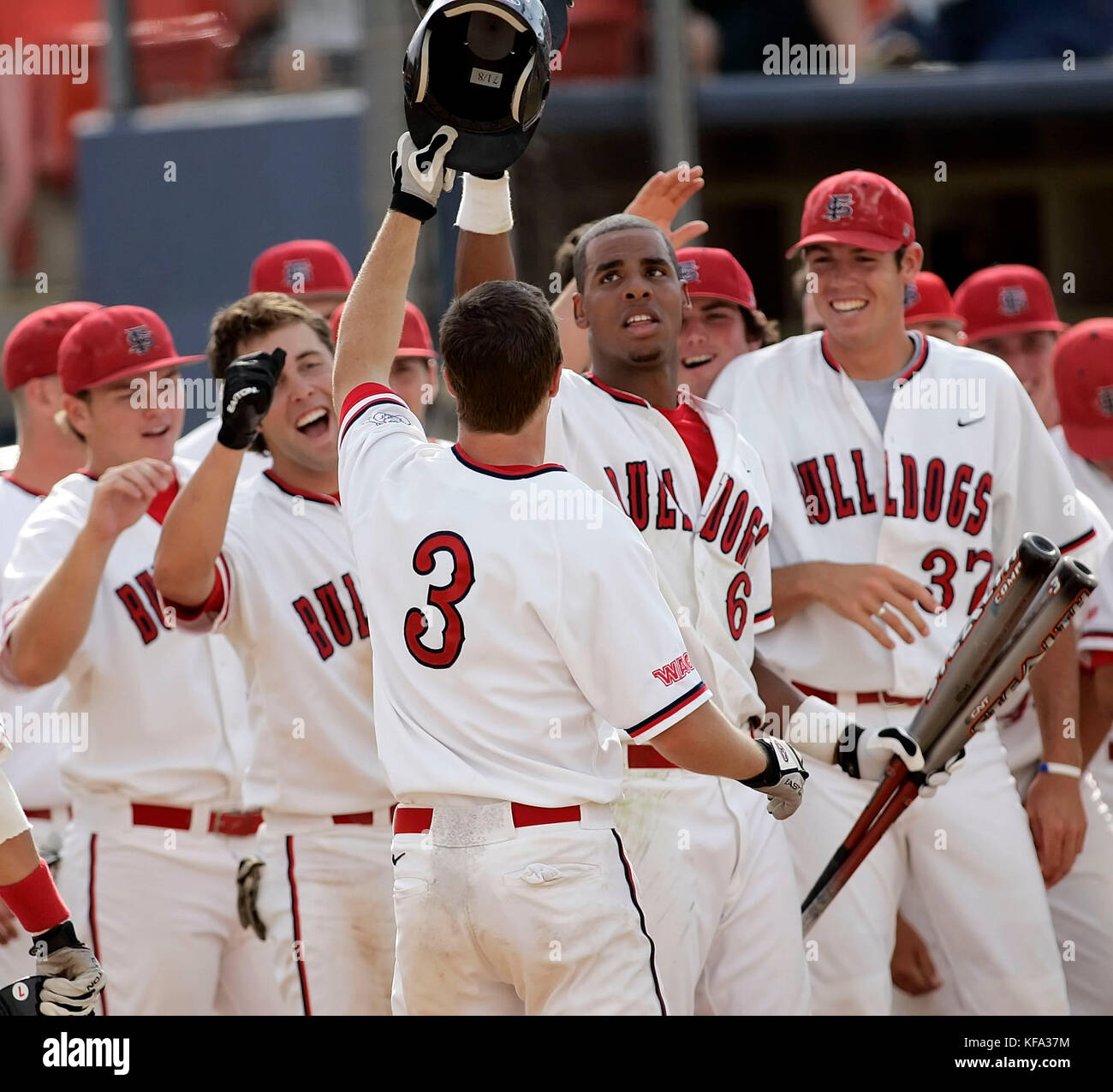 Fresno State's Eric Wetzel (3) celebrates with his teammates after hitting a home run off San Diego pitcher Josh Butler in the third inning of an NCAA Regional college baseball game in Fullerton, Calif. on Friday, June 2, 2006. Photo by Francis Specker Stock Photo