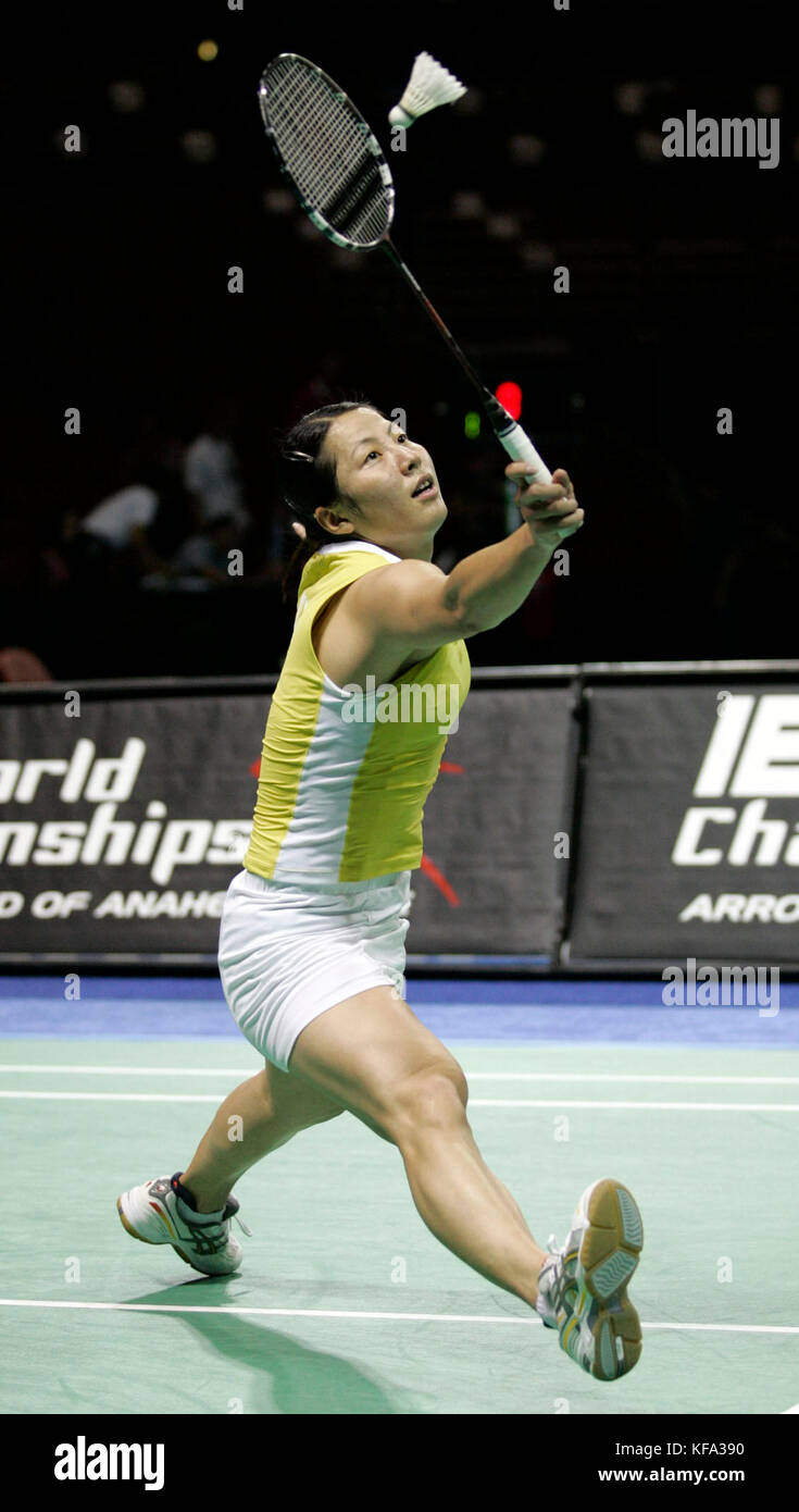 Huaiwen Xu of Germany hits a forehand volley against Hongyan Pi of France during a quarterfinal match at the IBF Badminton World Championships in Anaheim, Calif. on Friday, Aug. 19, 2005. Xu won, 11-3, 11-2.  Photo by Francis Specker Stock Photo