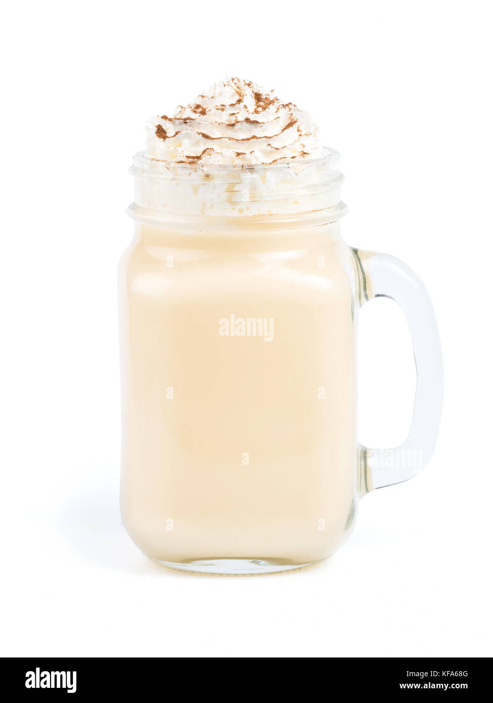 Eggnog with whipped cream and cinnamon in mason jar isolated on white ...
