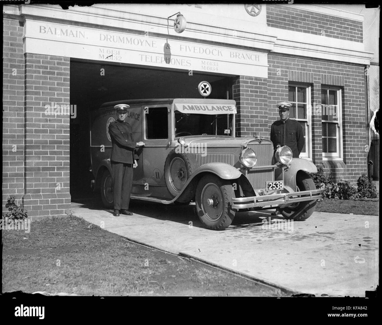 Ambulance and officers outside the Balmain, Drummoyne and Five Dock Branch of the Central District Ambulance (3857774030) Stock Photo