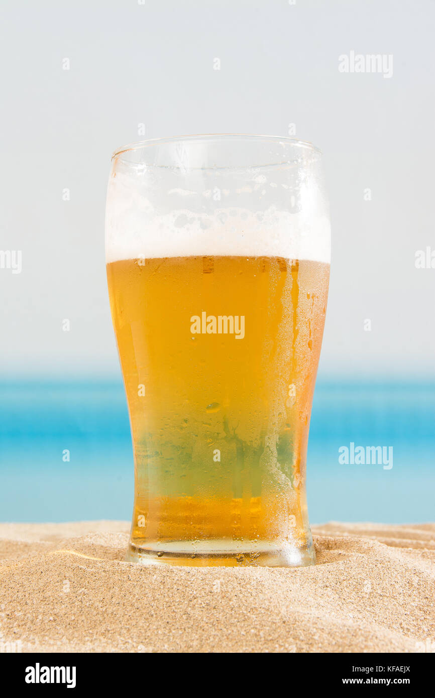 Beer on the beach Stock Photo Alamy