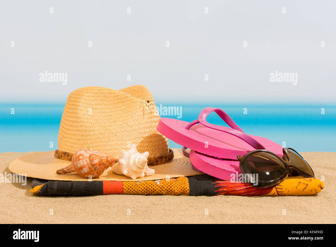 Flip flops on the beach Stock Photo - Alamy