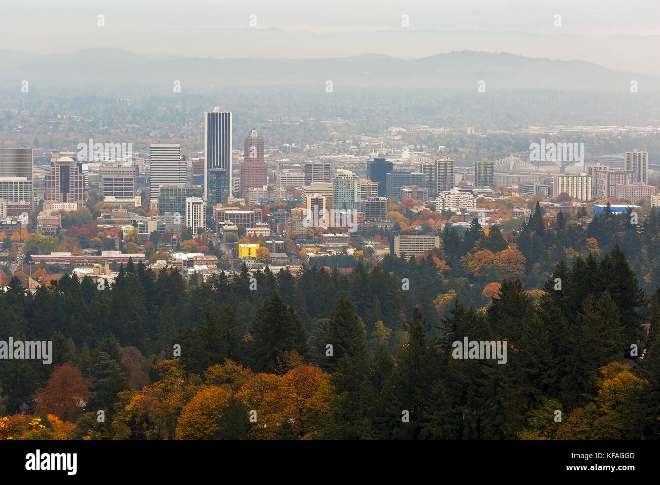 Foggy day over downtown Portland Oregon cityscape during fall season Stock Photo