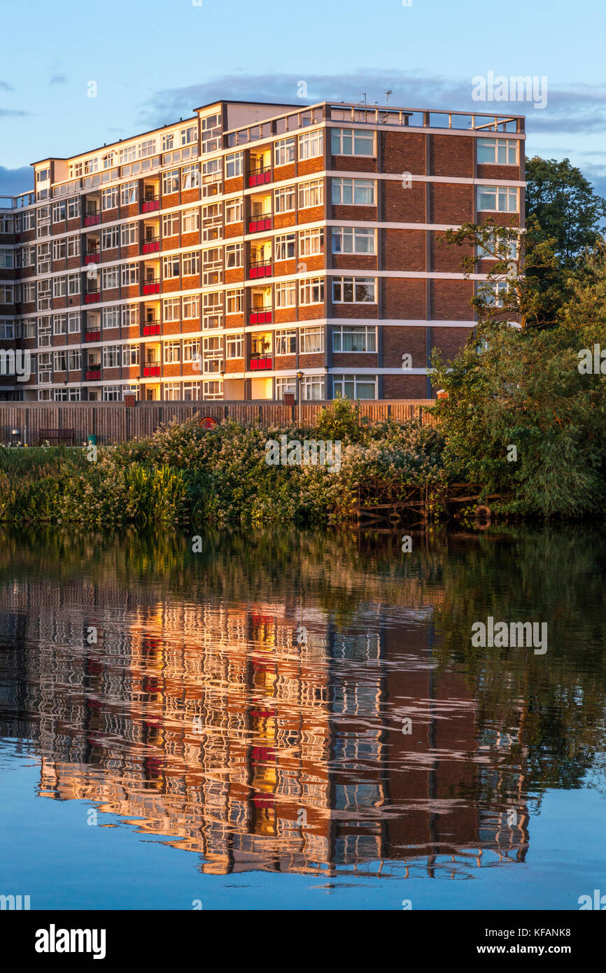 Rivermead. Riverside apartments at dawn on the waterside by the River Trent, West Bridgford, Nottinghamshire, England, UK Stock Photo