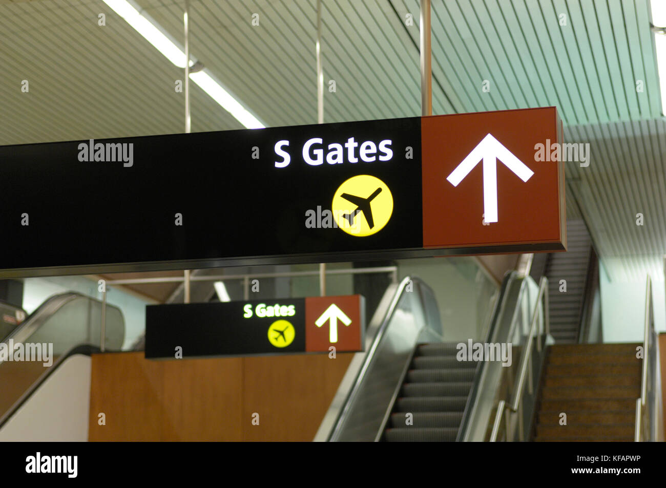 sign for Gate S and arrow in the South Terminal Stock Photo - Alamy
