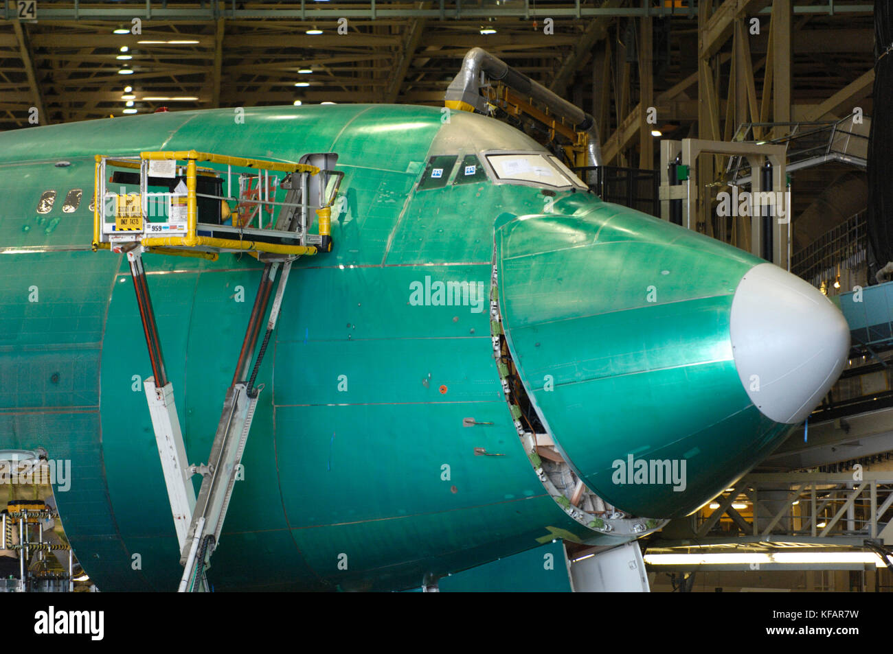 a Jade Cargo International Boeing 747-400F (LN1391) on the production-line with nose cargo door closing Stock Photo