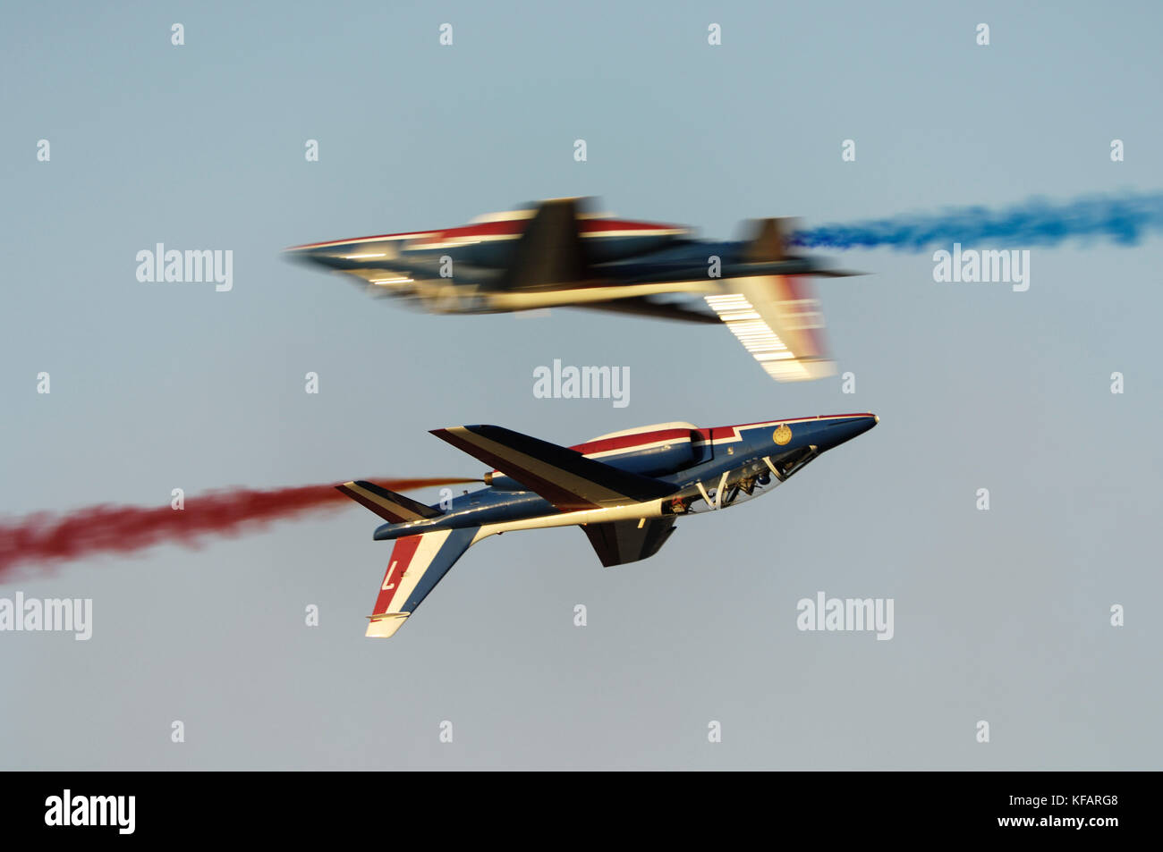 France - Air Force Patrouille de France Armee de l'Air Dassault Breguet Dornier Alpha Jets flying in formation with smoke at the Dubai AirShow 2007 Stock Photo