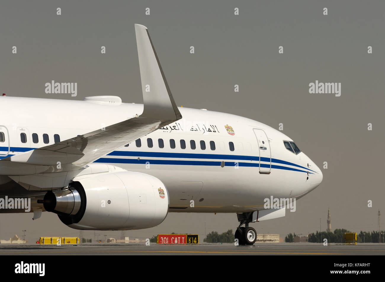 winglwt, engine and forward fuselage of a Dubai Air Wing Boeing 737-800 BBJ2 taxiing Stock Photo