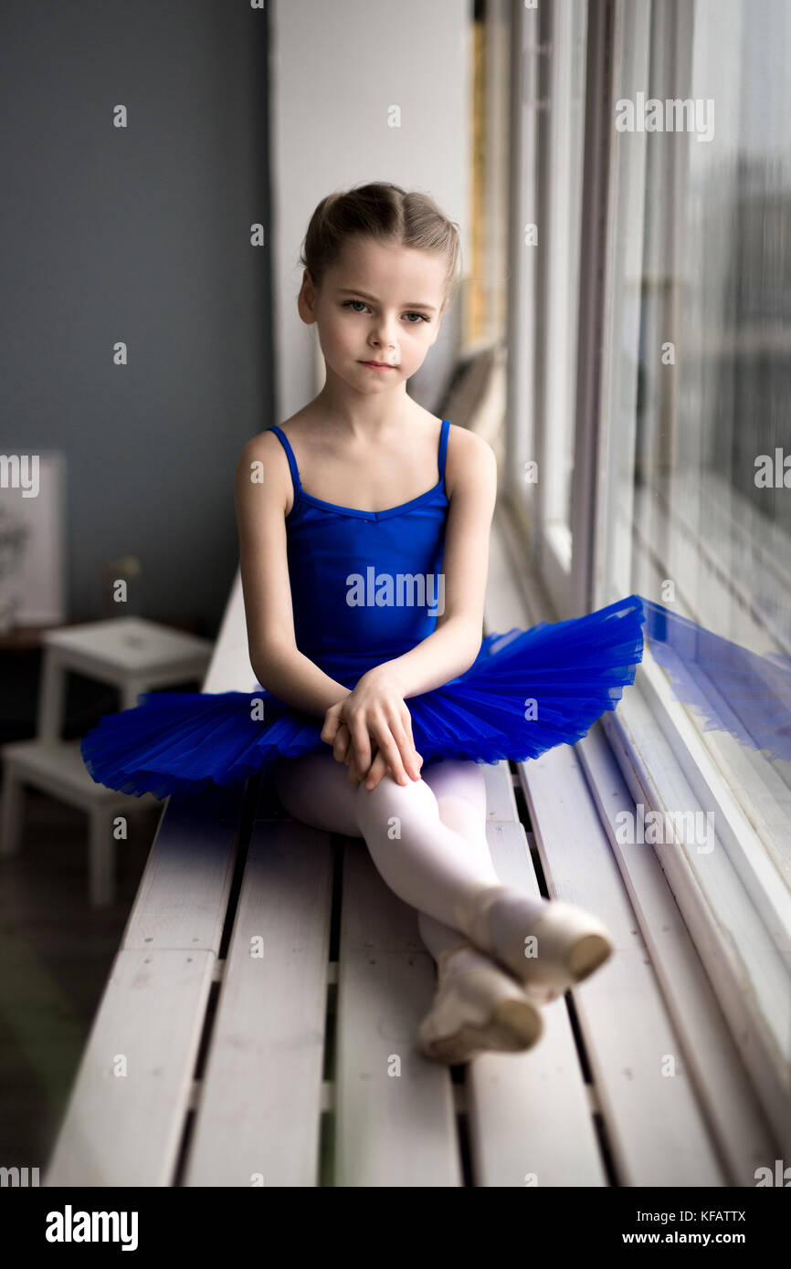 little girl dreams of becoming a ballerina. Child girl in a blue ballet  costume dancing in a room Stock Photo - Alamy
