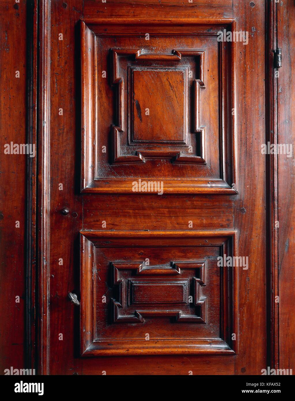 Italian, seventeenth century. Cabinet in walnut with inlays of maple production in Lombardy. First half of the seventeenth century. Particular. Stock Photo