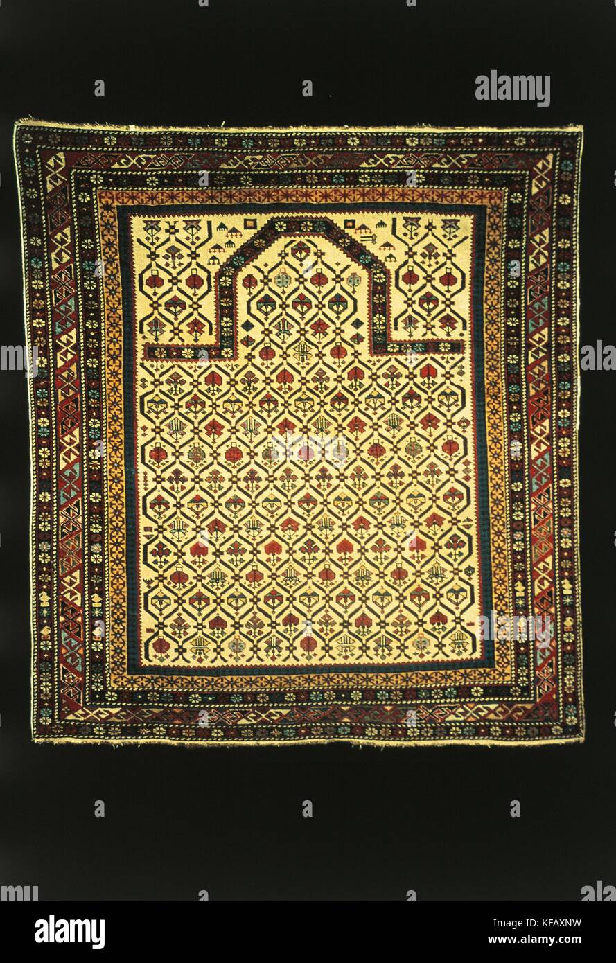 EGYPT XIX CENTURY CARPET AND SMALL MARASALI 1.60 X1 stylized floral motifs, 20 Stock Photo