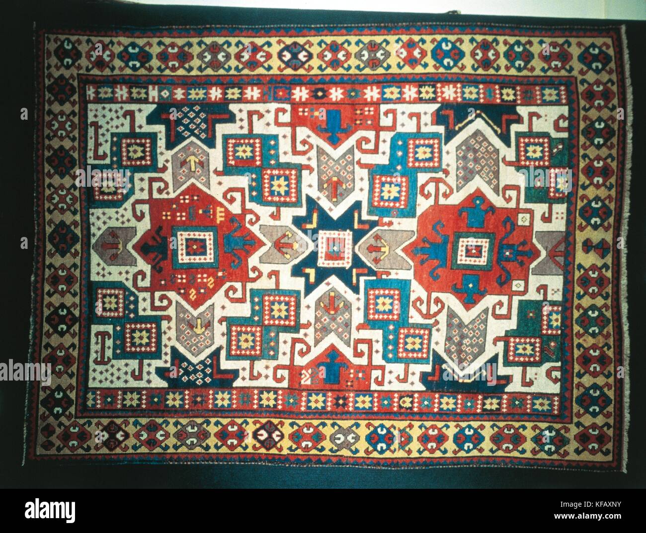 XIX CENTURY KAZAK Caucasian carpets with central medallion and geometric 2.35 X1, 40 Stock Photo