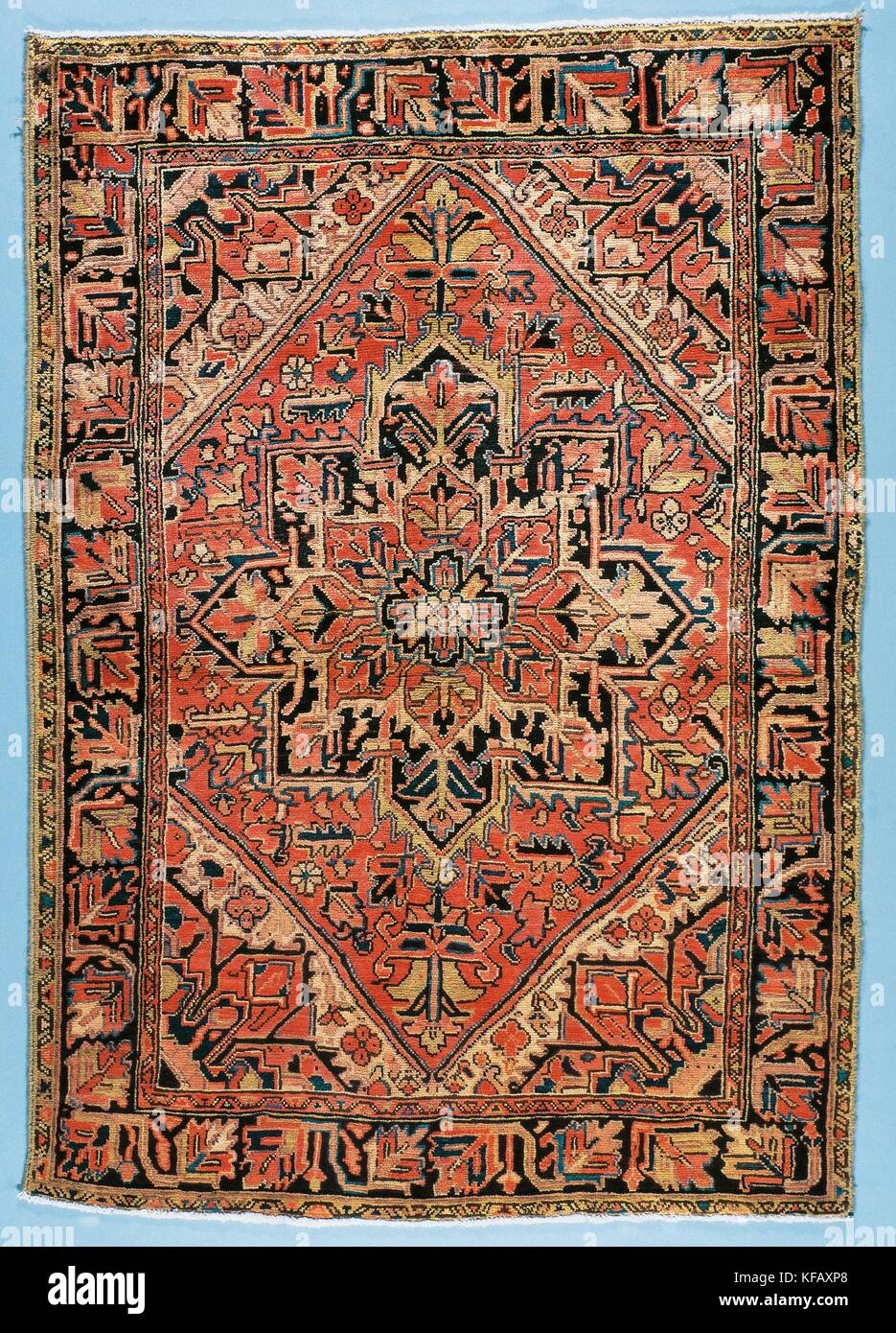 Rugs, Iran, Heriz rug with central medallion and stylized floral motif Canton, measuring 2.50 x 1.50 m. Stock Photo