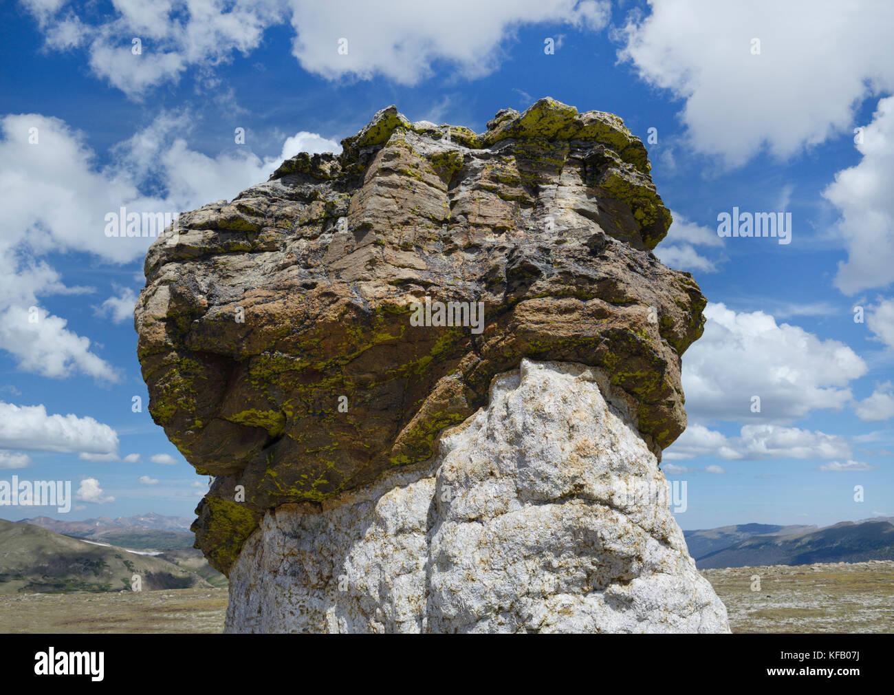 Mushroom-shaped rocks, Rocky Mountain National Park, CO. Dark colored schist above lighter colored granite. the granite has eroded faster and narrowed Stock Photo