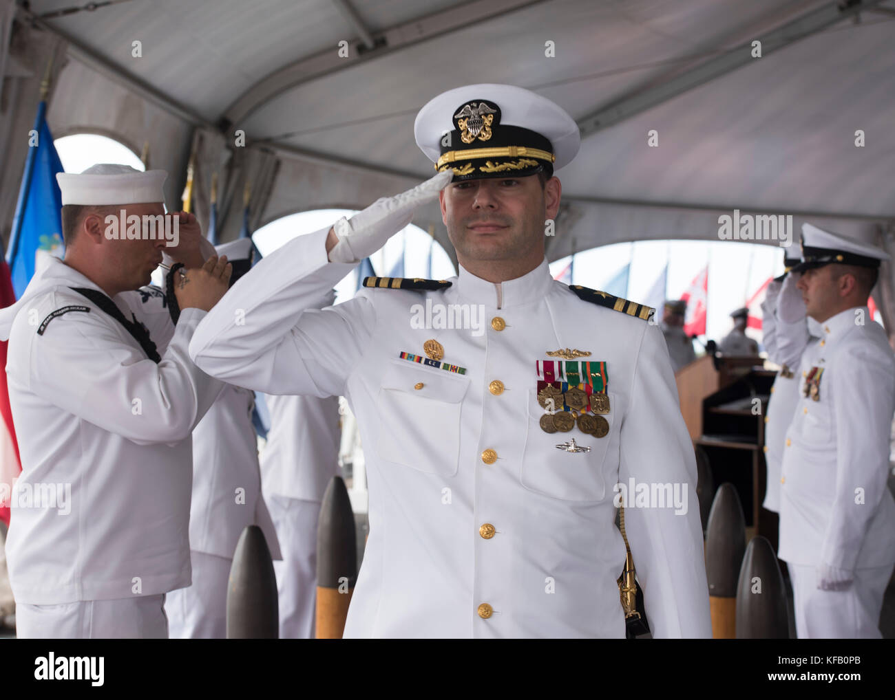 U.S. Navy Naval Submarine Support Command Commander Christopher Lindberg is piped aboard the Battleship Missouri Memorial during a change-of-command ceremony October 13, 2017 in Pearl Harbor, Hawaii.   (photo by Michael Lee via Planetpix) Stock Photo