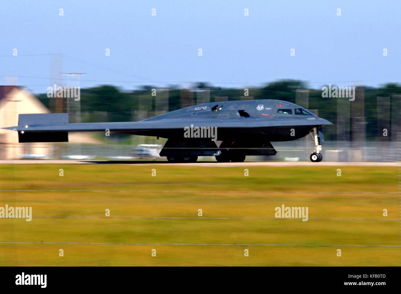 A U.S. Air Force B-2 Spirit stealth bomber aircraft takes off from the runway at the Whiteman Air Force Base August 24, 2009 near Knob Noster, Missouri.   (photo by Kenny Holston via Planetpix) Stock Photo