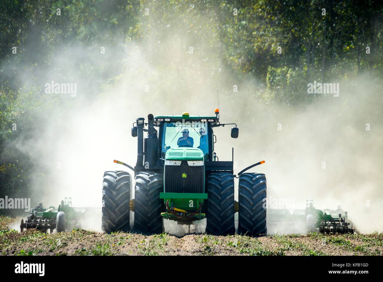 U.S. Agriculture Secretary Sonny Perdue drives a tractor through a