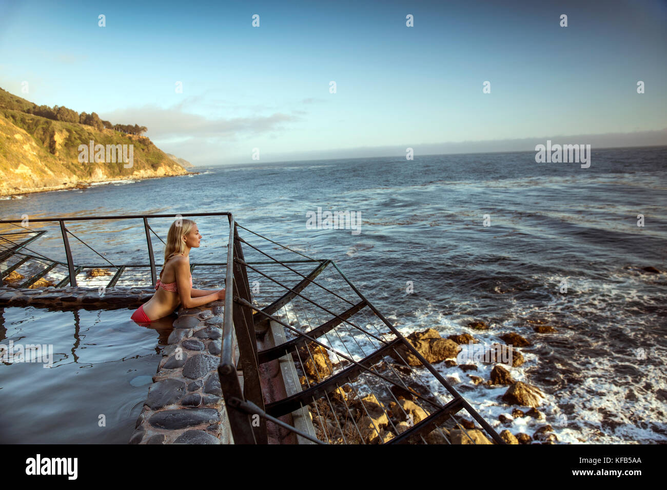 USA, California, Big Sur, Esalen, a woman sits in the Baths and looks Stock  Photo - Alamy