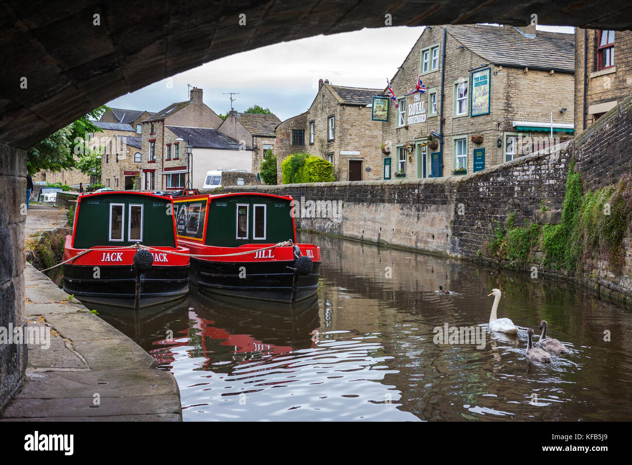 Narrow boats on the Springs Branch of the Leeds and Liverpool Canal at ...