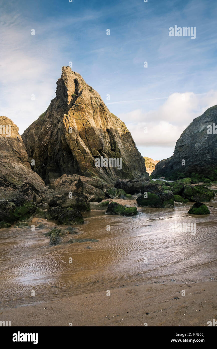 Holywell Bay in Cornwall - a stream running through rugged rocks at Holywell Bay in Newquay, Cornwall. Stock Photo