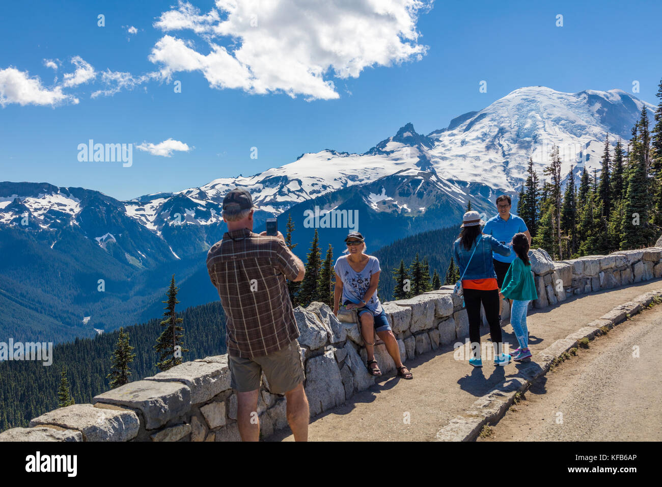 Tourists at the Sunrise area of Mount Rainier National Park at an