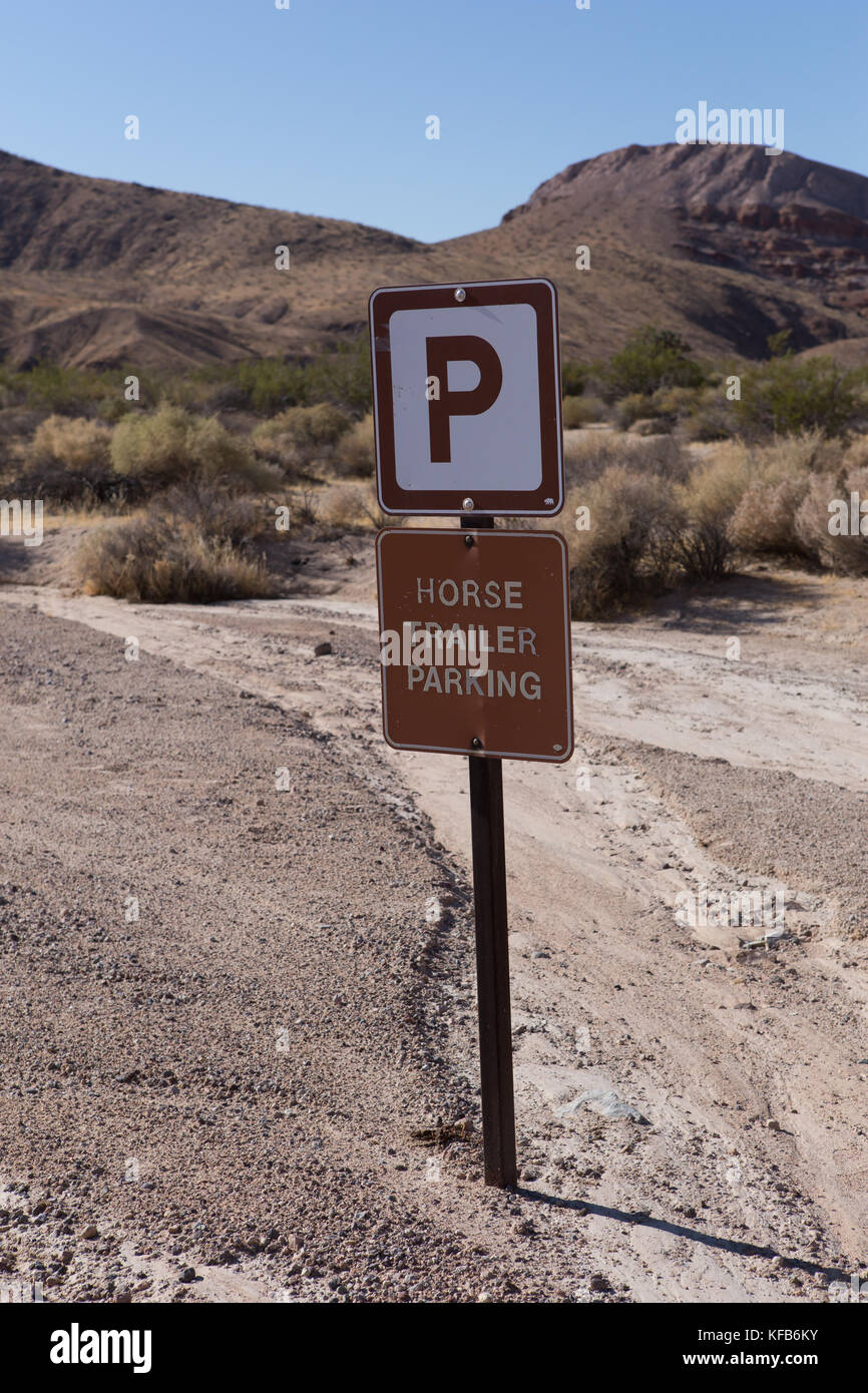 Horse trailer parking sign at Red Cliffs Natural Area in Red rock